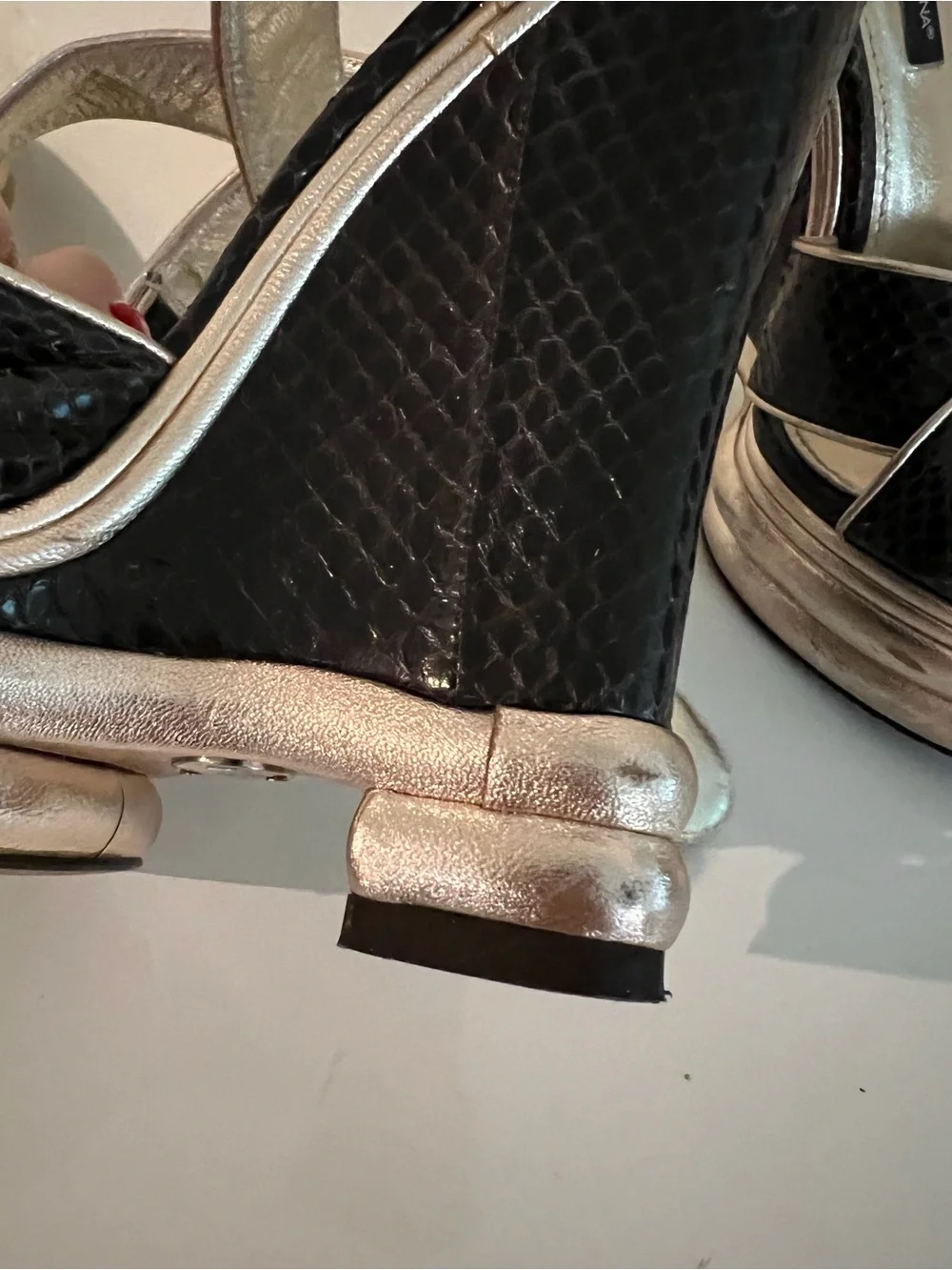 Dolce & Gabbana Black Snakeskin Wedge Sandals with Gold Accents..